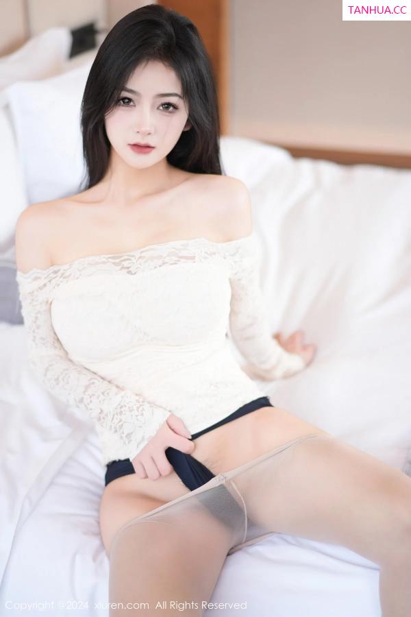   [XiuRen]高清写真图 2024.01.12 No.7954 谭小灵 丝袜美腿第22张图片